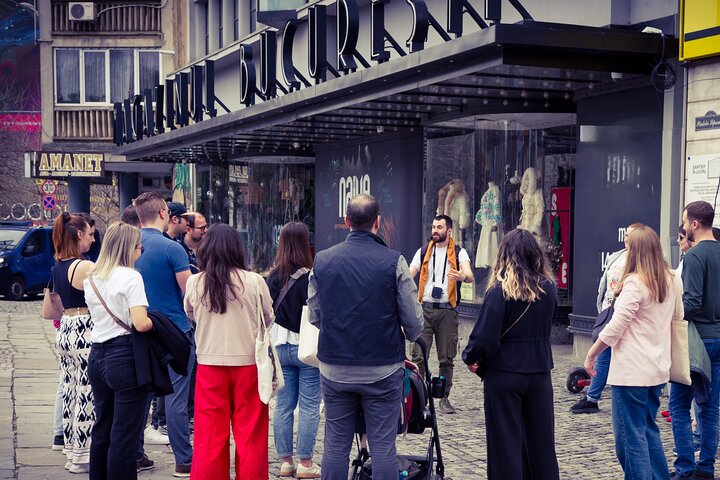 Tour group in front of building
