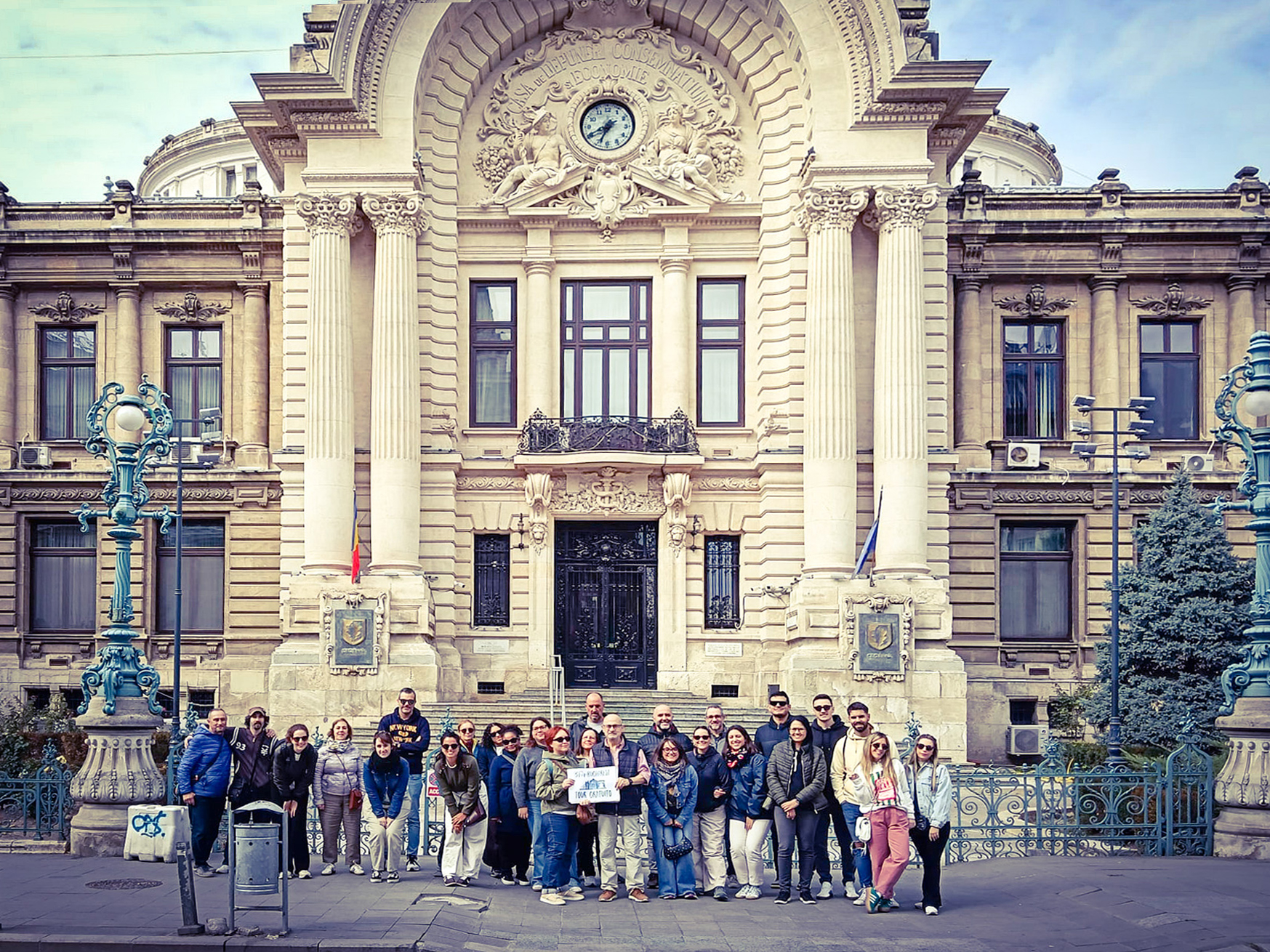 Tour group in front of building